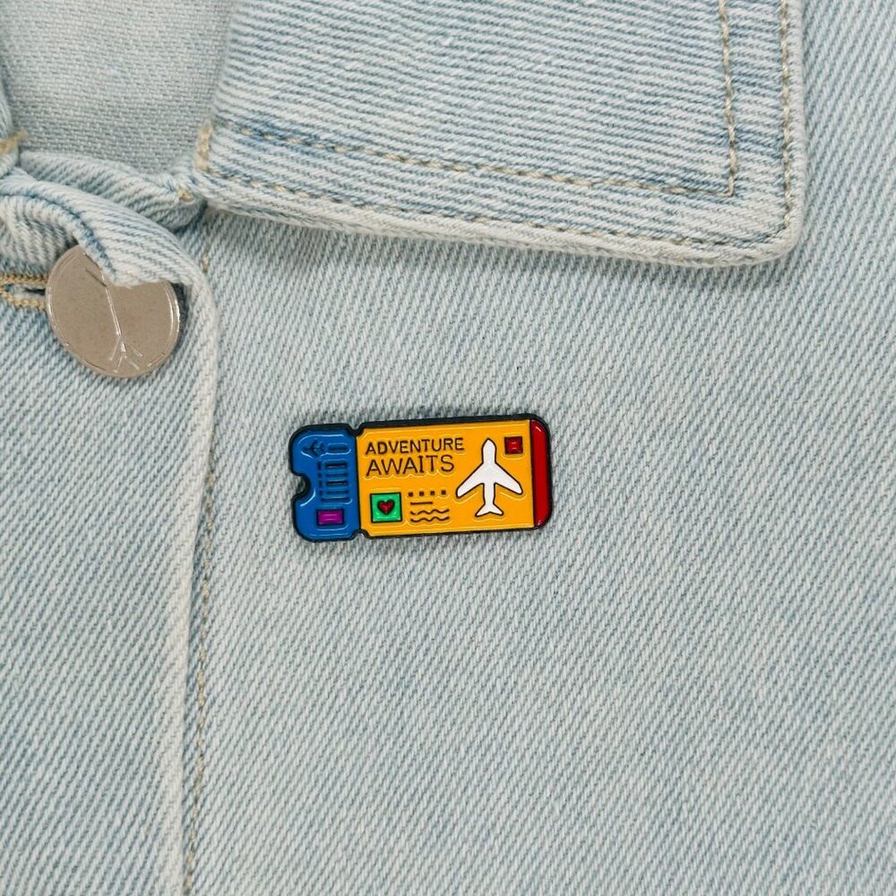 ⭐Enamel Pin Adventure Awaits Ticket Airplane Brooch Icon Cartoon Yellow New